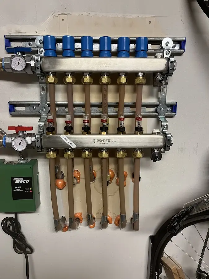 Plumber performing Water Heater Repair at a residential property in Lehigh Acres